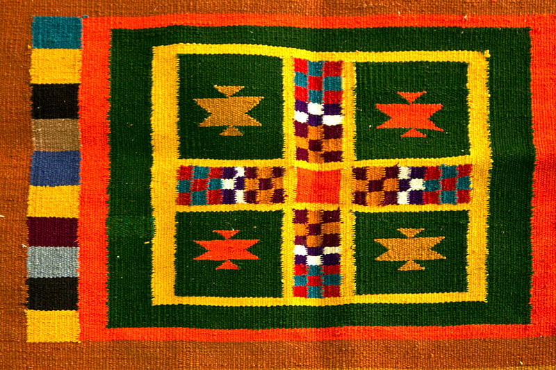 A Jamkhana dhurrie with traditional dice design